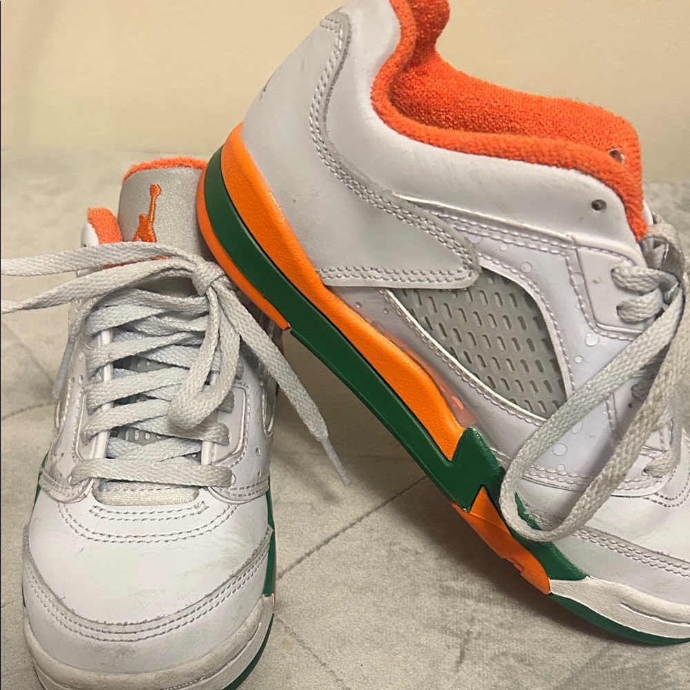 White and Orange Sneakers with Green Accents
